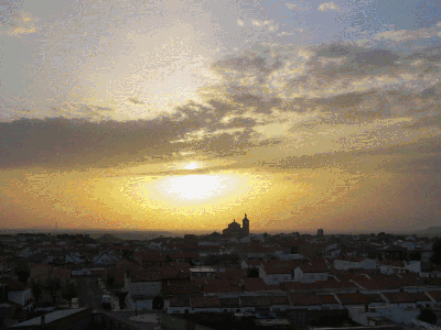 Puesta de sol sobre la Iglesia desde lo alto del depósito de las Casitas
