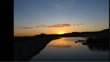 puesta-sol-laguna-artificial.mp4