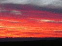 salida-sol-carretera-villanueva.gif