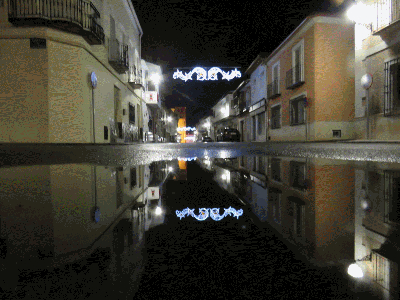 Simetrías nocturnas con la lluvia del día de Reyes desde la Glorieta
