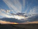 puesta-sol-camino-palo-carretero.gif